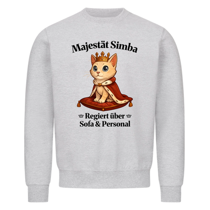 Majestät über Sofa und Personal